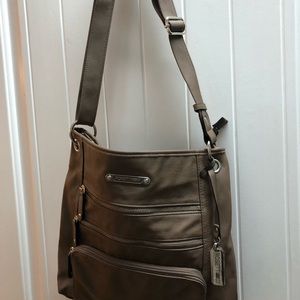 Rosetti adjustable strap purse.  Can be worn as a crossbody.